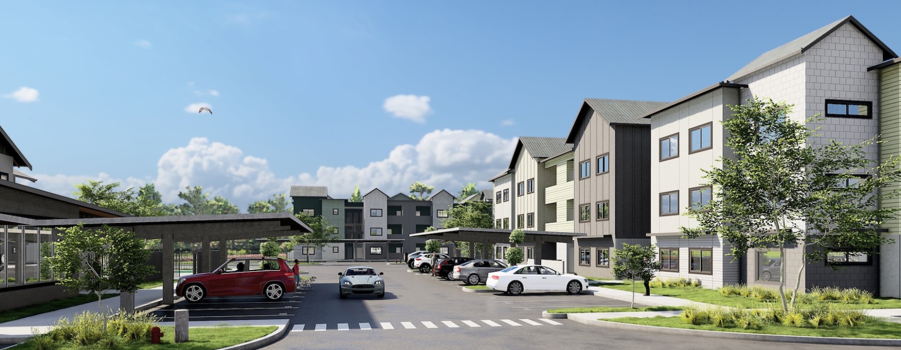 an apartment building with covered parking