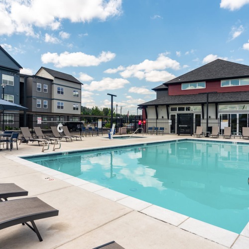 lounge chairs beside pool